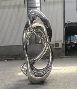 Edelstahlskulptur fließende Bänder, Höhe 300 cm, Ansicht 1