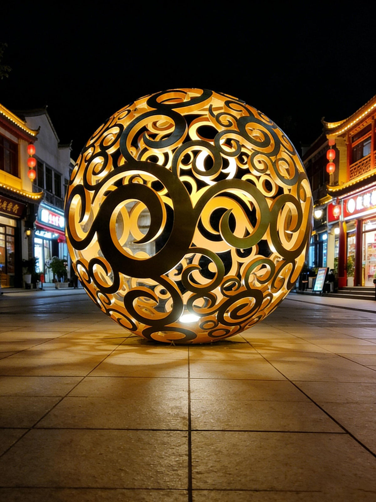 Edelstahlskulptur Lichtkugel mit Rankenwerk